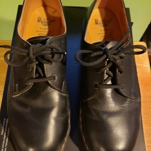 Dr Martens work shoes.